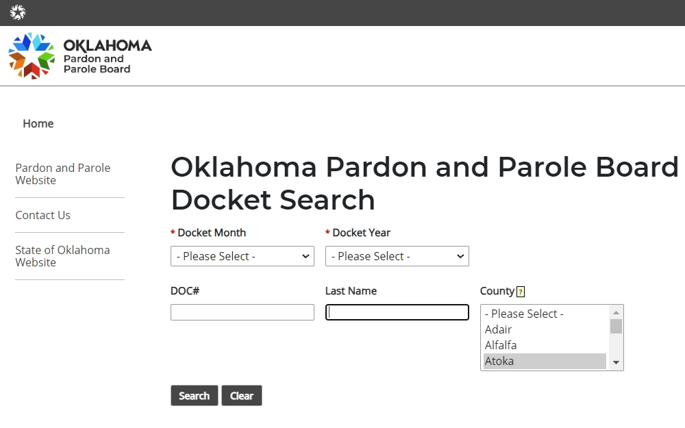 A screenshot of the Oklahoma Pardon and Parole Board website showing the docket search with needed fields, the docket month and year from a dropdown box, the DOC no., last name, and county from the scroll bar, as well as the page logo in the top left corner.